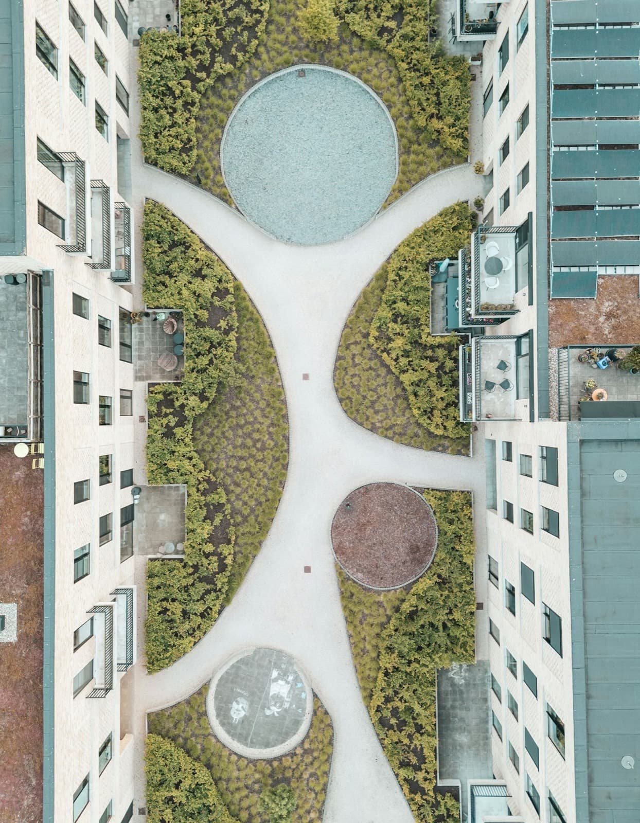 Modern buildings around a courtyard.